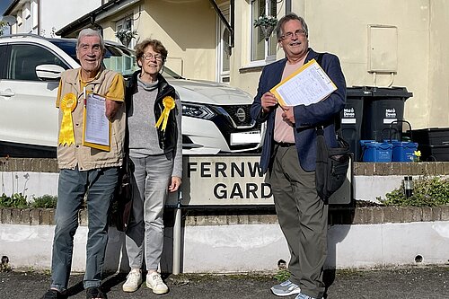 Cllrs. Frank and Natalia Letch and Mark Wooding collect signatures in Copplestone